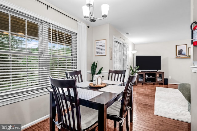 258 Tavistock, Cherry Hill, NJ 08034 - dining room featuring a chandelier, wood finished floors, and baseboards