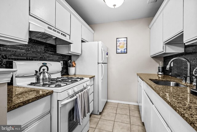 258 Tavistock, Cherry Hill, NJ 08034 - kitchen featuring white gas stove, under cabinet range hood, a sink, and backsplash