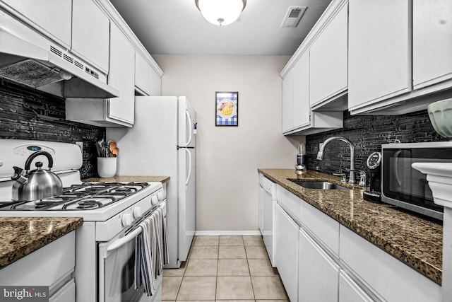 258 Tavistock, Cherry Hill, NJ 08034 - kitchen featuring white appliances, a sink, under cabinet range hood, backsplash, and white cabinets