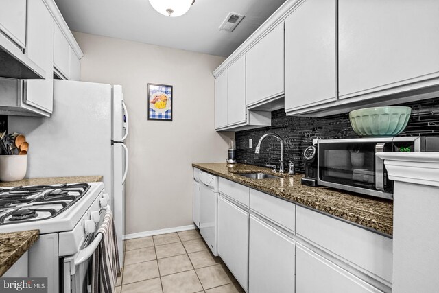258 Tavistock, Cherry Hill, NJ 08034 - kitchen with a sink, tasteful backsplash, white cabinets, white appliances, and dark stone counters