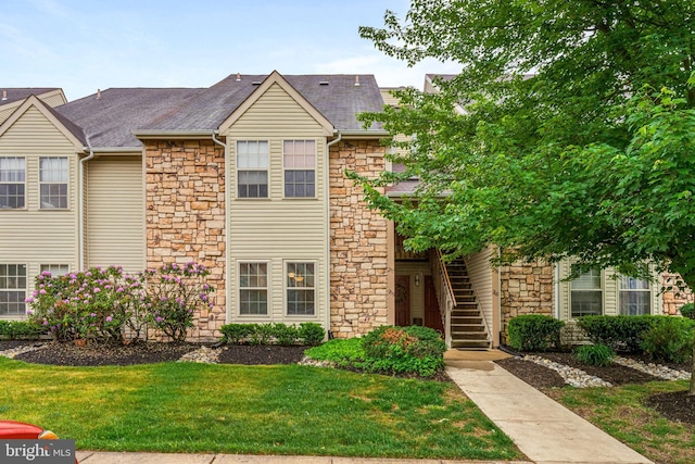 258 Tavistock, Cherry Hill, NJ 08034 - view of property with stone siding, stairs, a front yard, and a shingled roof