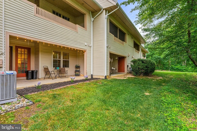 258 Tavistock, Cherry Hill, NJ 08034 - back of house featuring a yard, central air condition unit, and a balcony