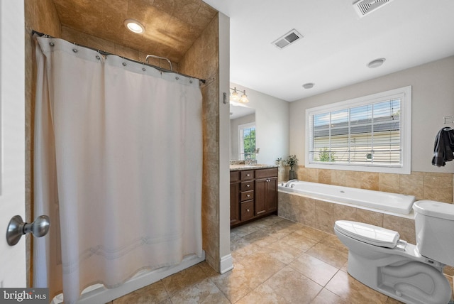 143 Oak St, Bridgewater, NJ 08807 - bathroom featuring toilet, vanity, a relaxing tiled tub, tile patterned floors, and a shower with curtain