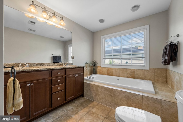 143 Oak St, Bridgewater, NJ 08807 - bathroom featuring toilet, double vanity, and a bath