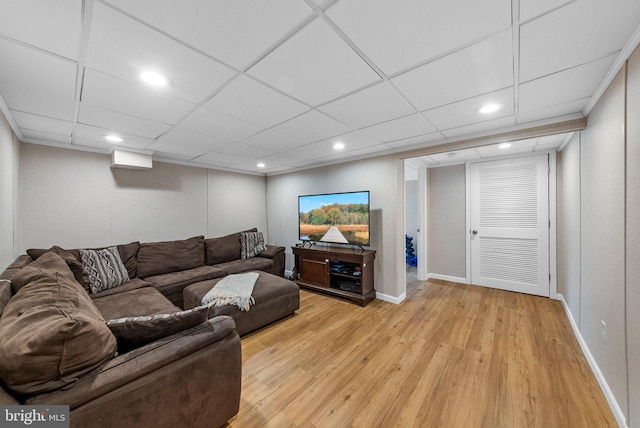 143 Oak St, Bridgewater, NJ 08807 - living room with light wood finished floors, baseboards, recessed lighting, and a drop ceiling