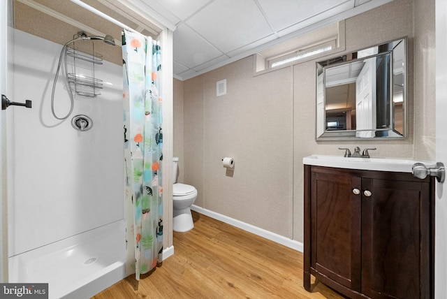 143 Oak St, Bridgewater, NJ 08807 - full bath featuring toilet, wood finished floors, a shower with curtain, vanity, and baseboards