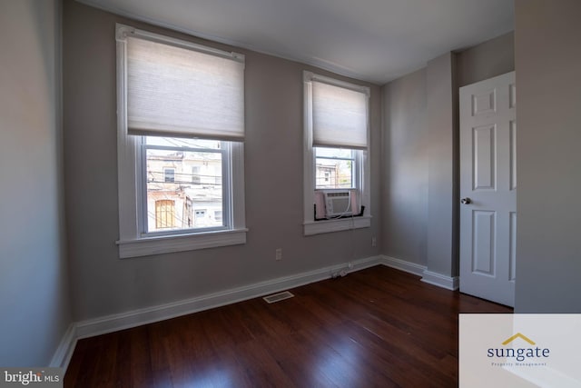 1210 Sargeant St, Baltimore, MD 21223 - spare room featuring dark wood-style floors and baseboards