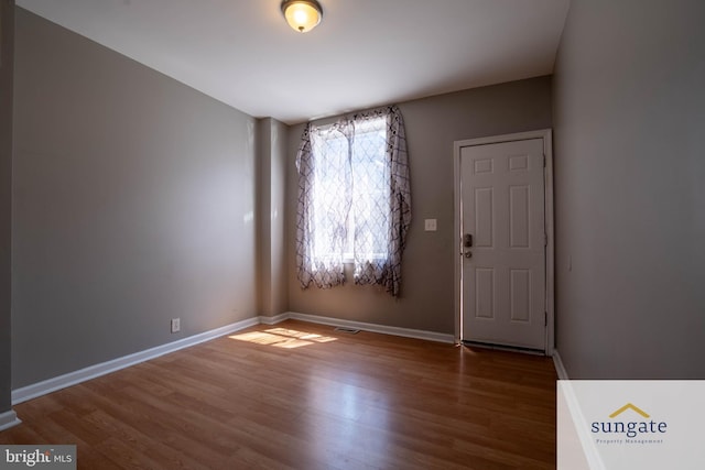 1210 Sargeant St, Baltimore, MD 21223 - unfurnished room with wood finished floors and baseboards
