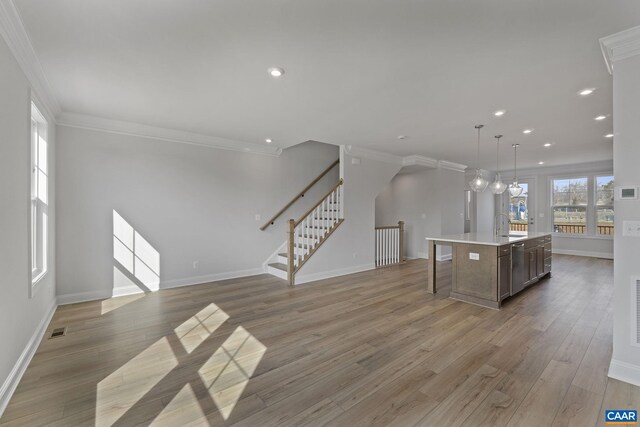 3615 Hilah Ln, Charlottesville, VA 22901 - kitchen featuring ornamental molding, light countertops, open floor plan, baseboards, and recessed lighting