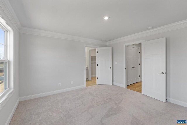 3615 Hilah Ln, Charlottesville, VA 22901 - unfurnished bedroom featuring light colored carpet, ornamental molding, baseboards, a walk in closet, and recessed lighting