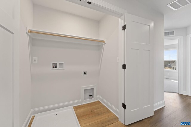 3615 Hilah Ln, Charlottesville, VA 22901 - laundry area featuring washer hookup, electric dryer hookup, wood finished floors, and baseboards