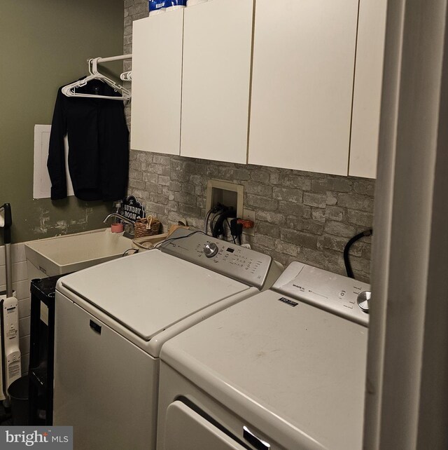 102 Northside Rd, Elverson, PA 19520 - washroom with washer and clothes dryer and cabinet space