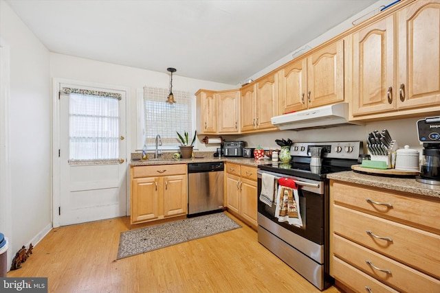 2722 E Riding Dr, Wilmington, DE 19808 - kitchen featuring stainless steel appliances, under cabinet range hood, light brown cabinets, and a sink