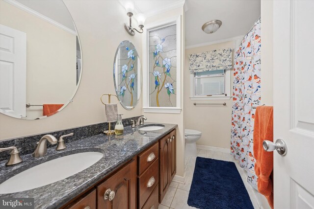 2722 E Riding Dr, Wilmington, DE 19808 - bathroom with toilet, double vanity, tile patterned flooring, ornamental molding, and baseboards