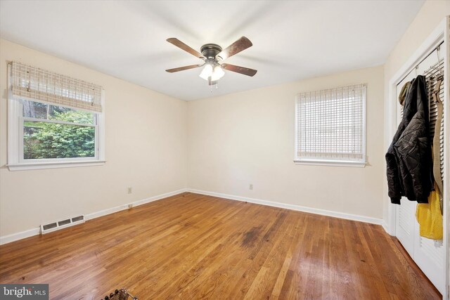 2722 E Riding Dr, Wilmington, DE 19808 - unfurnished bedroom with light wood-style floors, baseboards, a closet, and ceiling fan