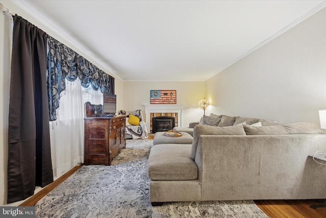 2722 E Riding Dr, Wilmington, DE 19808 - living room with wood finished floors, ornamental molding, and a brick fireplace