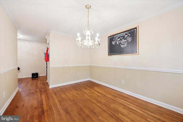 2722 E Riding Dr, Wilmington, DE 19808 - spare room featuring wood finished floors, crown molding, a chandelier, and baseboards