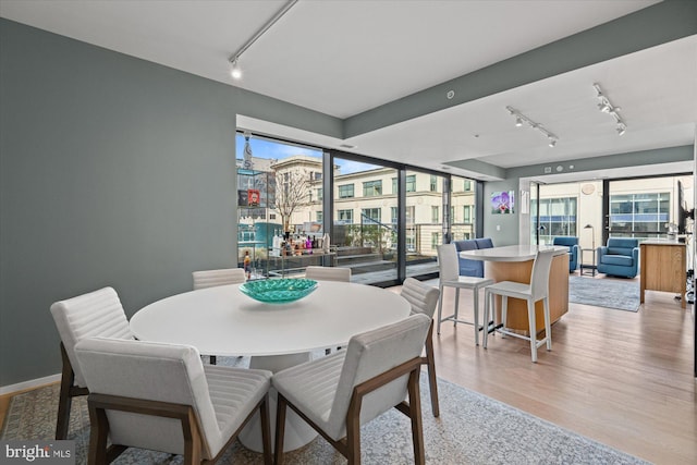 925 H St NW Unit 810, Washington, DC 20001 - dining space featuring track lighting and light wood-style flooring