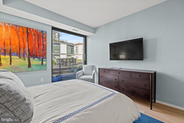 925 H St NW Unit 810, Washington, DC 20001 - bedroom with wood finished floors and baseboards