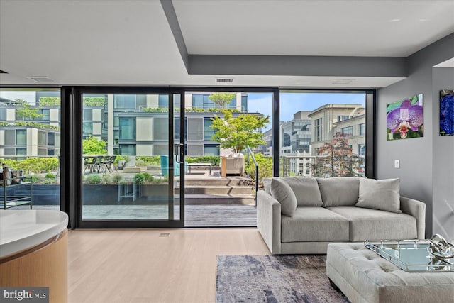 925 H St NW Unit 810, Washington, DC 20001 - living room featuring wood finished floors and expansive windows