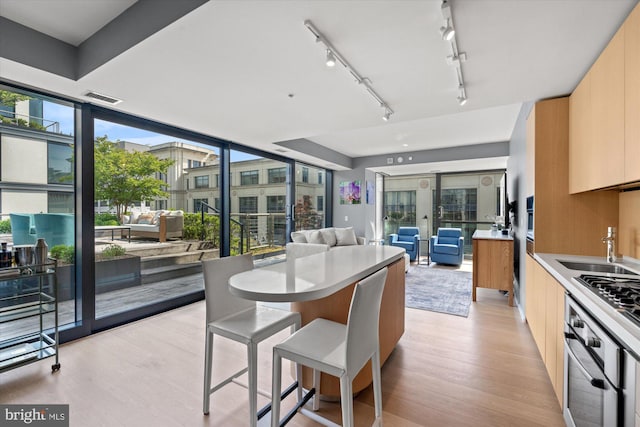 925 H St NW Unit 810, Washington, DC 20001 - kitchen with modern cabinets, appliances with stainless steel finishes, and open floor plan