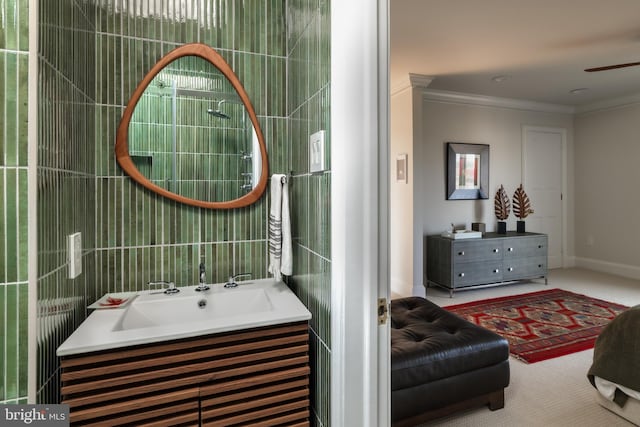 1914 35th St NW, Washington, DC 20007 - bathroom with vanity, ornamental molding, and a ceiling fan