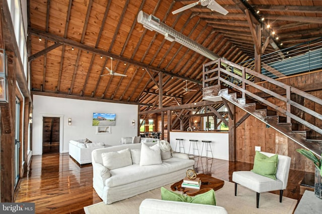 820 Spring Hill Rd, Riegelsville, PA 18077 - living room featuring wooden ceiling with exposed beams, hardwood / wood-style flooring, stairway, high vaulted ceiling, and baseboards