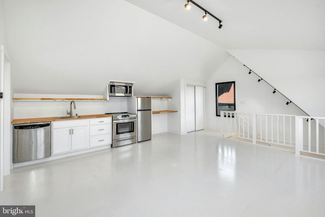 820 Spring Hill Rd, Riegelsville, PA 18077 - interior space featuring stainless steel appliances, a sink, open shelves, wooden counters, and white cabinets