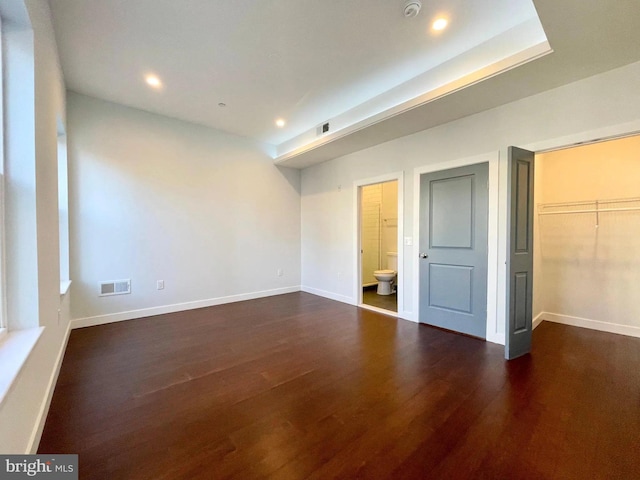 1337 N Franklin St, Philadelphia, PA 19122 - unfurnished bedroom with recessed lighting, dark wood-style flooring, baseboards, connected bathroom, and a closet