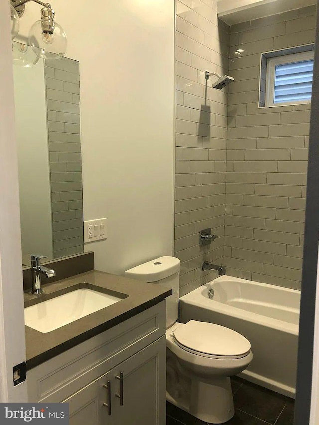 1337 N Franklin St, Philadelphia, PA 19122 - full bathroom with toilet, vanity,  shower combination, and tile patterned floors