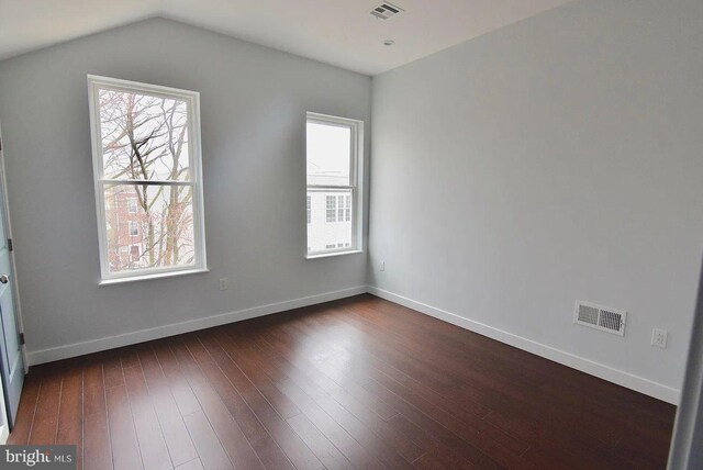 1337 N Franklin St, Philadelphia, PA 19122 - spare room featuring healthy amount of natural light, dark wood finished floors, baseboards, and lofted ceiling