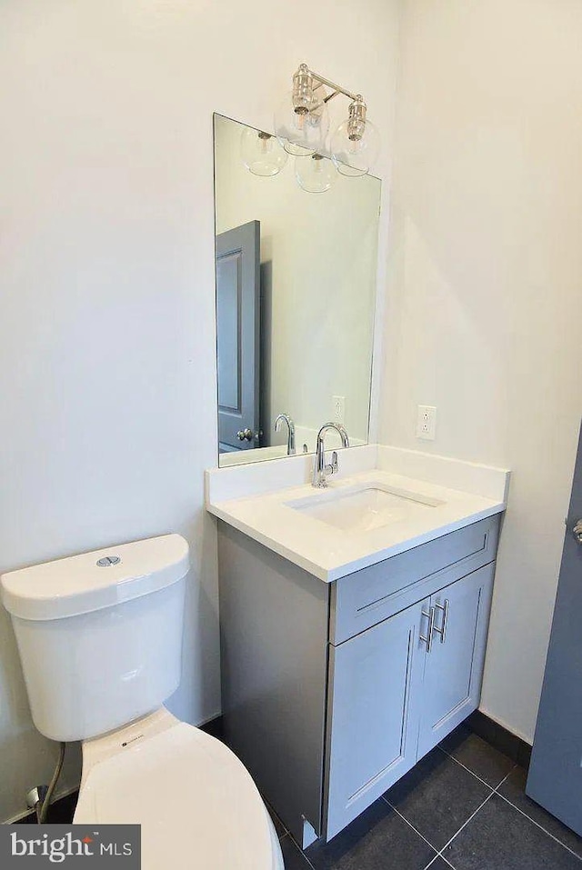 1337 N Franklin St, Philadelphia, PA 19122 - bathroom featuring vanity, tile patterned flooring, and toilet