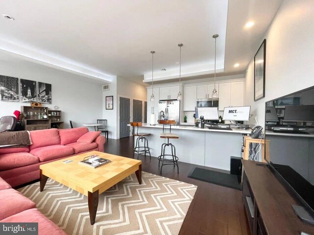 1337 N Franklin St, Philadelphia, PA 19122 - living area featuring dark wood-style floors and recessed lighting
