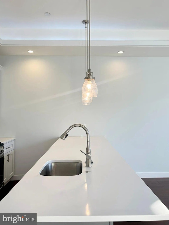 1337 N Franklin St, Philadelphia, PA 19122 - kitchen view of a sink, light countertops, decorative light fixtures, and recessed lighting