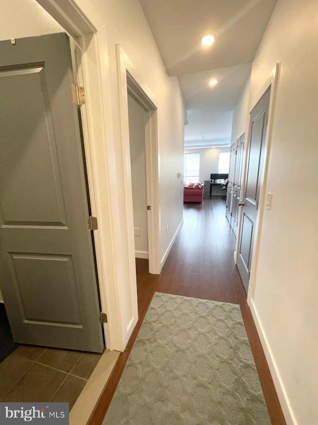 1337 N Franklin St, Philadelphia, PA 19122 - hallway with dark wood finished floors, baseboards, and recessed lighting