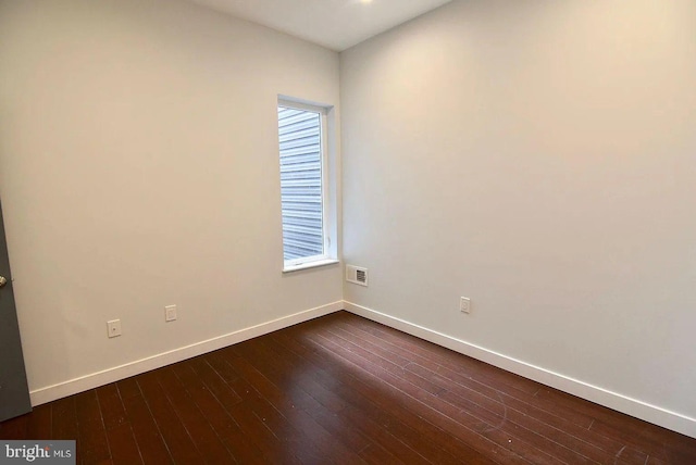 1337 N Franklin St, Philadelphia, PA 19122 - spare room with baseboards, dark wood finished floors, and healthy amount of natural light
