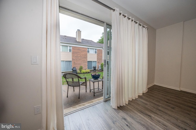 1380 Putnam Blvd Unit 4, Wallingford, PA 19086 - doorway to outside with wood finished floors and baseboards