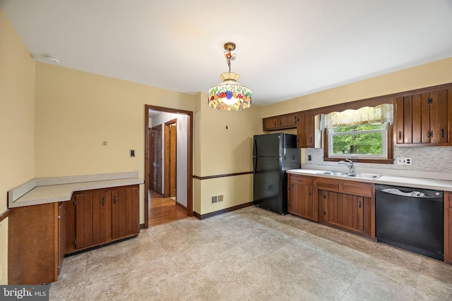 2507 Garth Rd, Wilmington, DE 19810 - kitchen featuring black appliances, a sink, light countertops, and tasteful backsplash