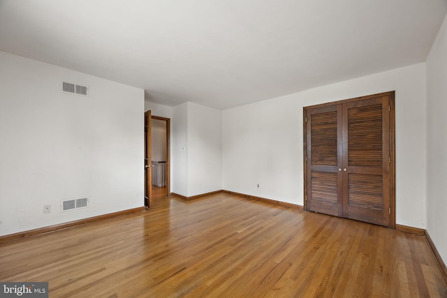 2507 Garth Rd, Wilmington, DE 19810 - unfurnished bedroom featuring light wood-style floors, baseboards, and a closet