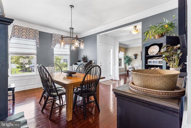 318 Windsor Rd, Mullica Hill, NJ 08062 - dining space featuring dark wood-style floors and crown molding
