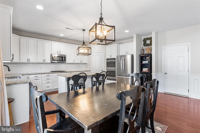 318 Windsor Rd, Mullica Hill, NJ 08062 - dining room with a chandelier, dark wood-type flooring, and recessed lighting
