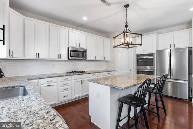 318 Windsor Rd, Mullica Hill, NJ 08062 - kitchen with stainless steel appliances, recessed lighting, white cabinetry, and dark wood-type flooring