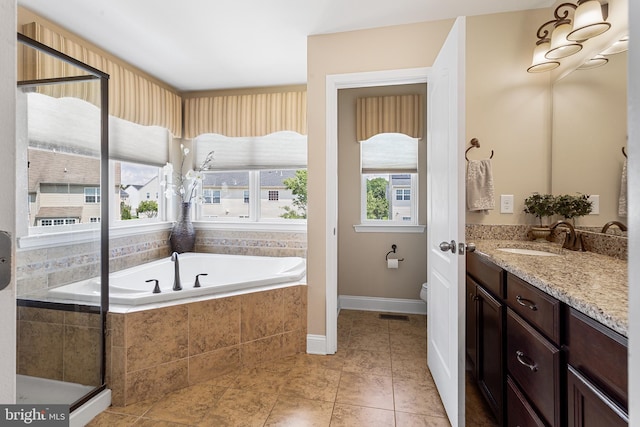 318 Windsor Rd, Mullica Hill, NJ 08062 - bathroom with vanity, a bath, toilet, tile patterned floors, and baseboards