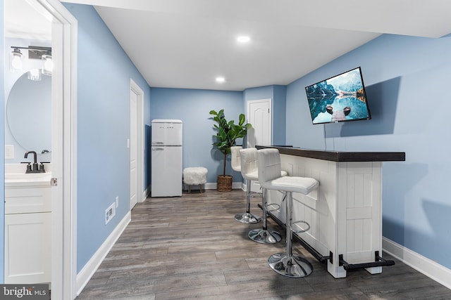 318 Windsor Rd, Mullica Hill, NJ 08062 - indoor dry bar featuring freestanding refrigerator, dark wood-style floors, baseboards, and recessed lighting