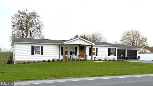 343 N Locust St, Myerstown, PA 17067 - single story home featuring covered porch, a garage, and driveway