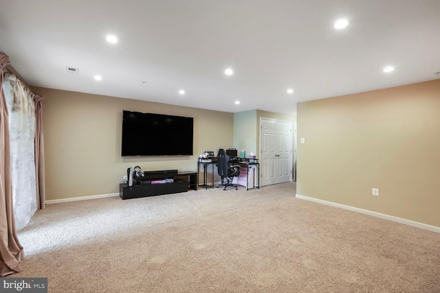 3627 Singleton Ter, Frederick, MD 21704 - living room with light carpet, baseboards, recessed lighting, and a desk
