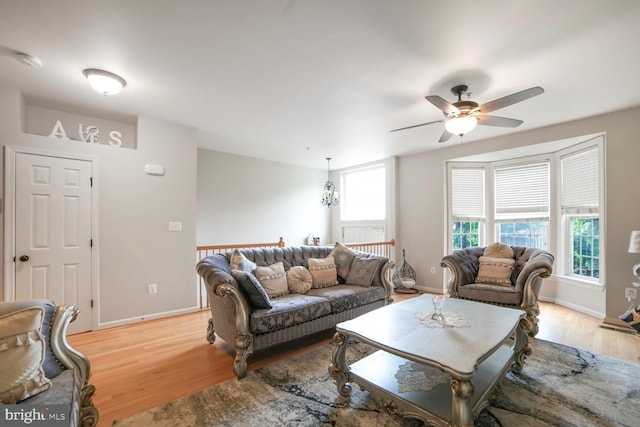 3627 Singleton Ter, Frederick, MD 21704 - living area featuring a ceiling fan, light wood-type flooring, and baseboards