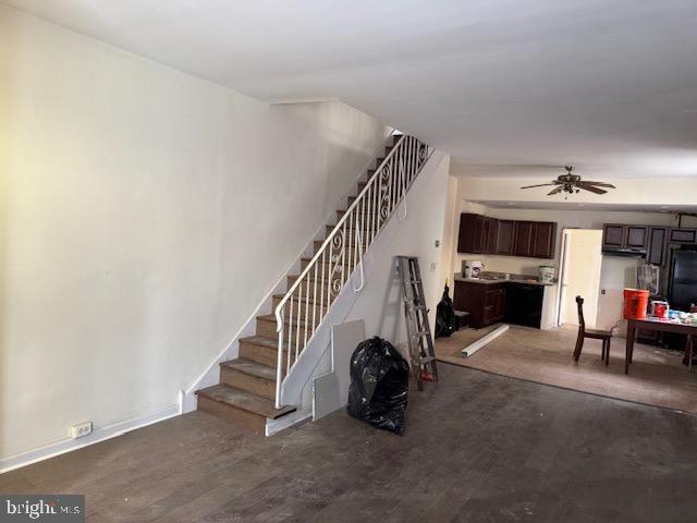 1232 S 11th St, Philadelphia, PA 19147 - staircase with ceiling fan and wood finished floors