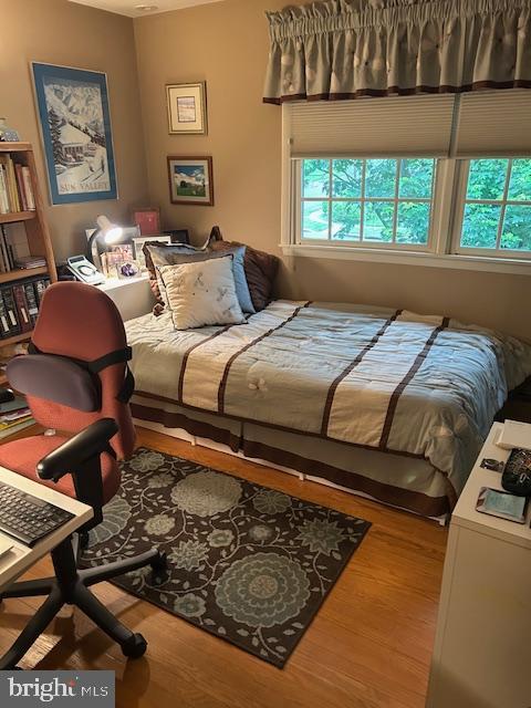 1469 Cathys Ln, North Wales, PA 19454 - bedroom featuring multiple windows and wood finished floors