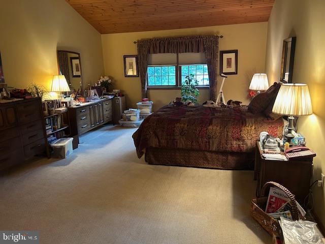 1469 Cathys Ln, North Wales, PA 19454 - bedroom with wood ceiling, carpet floors, and vaulted ceiling